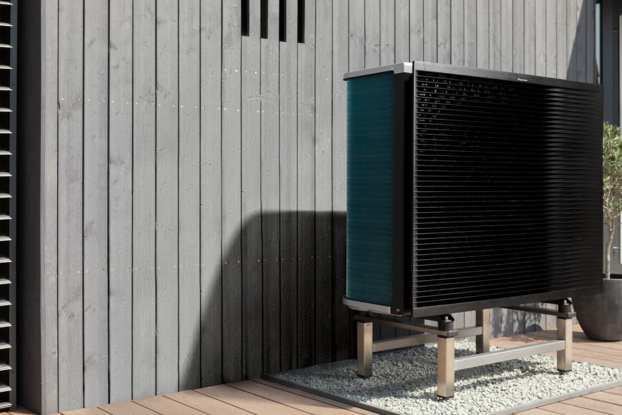 Daikin Altherma outdoor heat pump installed at a modern home Daikin Altherma outdoor heat pump installed at a modern home